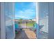 Private balcony with outdoor seating overlooking the neighborhood, offering relaxation and fresh air at 13307 Alderley Dr, Orlando, FL 32832