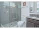 Bathroom featuring modern gray tile in the shower, granite countertops, and updated fixtures at 13307 Alderley Dr, Orlando, FL 32832