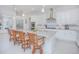 Bright, modern kitchen with granite countertops, stainless steel appliances, and a large island at 13307 Alderley Dr, Orlando, FL 32832