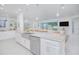 Open concept kitchen with large island, stainless steel appliances, and easy access to living area at 13307 Alderley Dr, Orlando, FL 32832