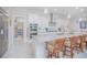 Bright kitchen features white cabinets, granite countertops, and a spacious walk-in pantry at 13307 Alderley Dr, Orlando, FL 32832