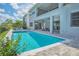 Backyard pool with patio, dining area, and outdoor seating. This area is perfect for outdoor entertaining at 13307 Alderley Dr, Orlando, FL 32832