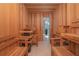 Relaxing sauna room with wood benches and a view of the shower at 13307 Alderley Dr, Orlando, FL 32832