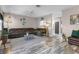 Spacious living room with neutral colors, modern furnishings and views into the kitchen at 13326 Fountainbleau Dr, Clermont, FL 34711