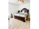 Bedroom with a large bed, ceiling fan, and neutral-toned walls and decor at 13405 Sw 86Th Ave, Ocala, FL 34473