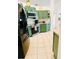 Bright kitchen featuring custom green cabinets and modern appliances at 13405 Sw 86Th Ave, Ocala, FL 34473