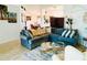 Comfortable living room with large sectional sofa and bright natural light at 13405 Sw 86Th Ave, Ocala, FL 34473