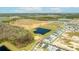 An aerial view of the neighborhood, showcasing the surrounding lakes, wetlands, and community layout at 15060 Brodie Ln, Winter Garden, FL 34787