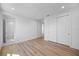 Spacious bedroom with wood floors and double door closet at 15060 Brodie Ln, Winter Garden, FL 34787