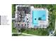 Aerial view of a resort-style pool with poolside amenities, fitness center, and lakeside lounge at 15060 Brodie Ln, Winter Garden, FL 34787