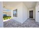 Inviting entryway with a modern black door and stylish brick flooring and recessed lighting at 15060 Brodie Ln, Winter Garden, FL 34787