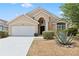 Charming house with a two-car garage, manicured landscaping, and decorative columns at 15746 Autumn Glen Ave, Clermont, FL 34714