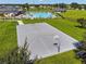 An aerial view shows the basketball court near the community pool and clubhouse on a sunny day at 1639 Pickerel Ct, Kissimmee, FL 34759