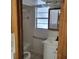 Bathroom featuring a shower-tub combo, and a vanity with a mirror at 1661 Votaw Rd, Apopka, FL 32703