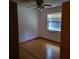 Bedroom with light hardwood floors, and a window at 1661 Votaw Rd, Apopka, FL 32703