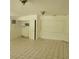 Large room with tile floors, open shelving, and ample storage space at 1661 Votaw Rd, Apopka, FL 32703