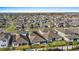 A high aerial view of the neighborhood and well-maintained lawns at 19318 Banfield Pl, Orlando, FL 32827
