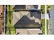 Aerial shot of house roof, including a view of street access and backyard at 19318 Banfield Pl, Orlando, FL 32827