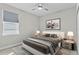 Comfortable bedroom with a large window, neutral colors and a plush rug at 19318 Banfield Pl, Orlando, FL 32827