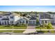 Charming home showcasing a well-manicured lawn, a brick driveway, and a two-car garage at 19318 Banfield Pl, Orlando, FL 32827