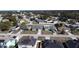 Overhead shot of homes in a planned community, showcasing neatly arranged streets and solar panels at 1956 Myakka Ct, Poinciana, FL 34759