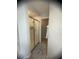 En suite bathroom featuring glass door shower and neutral tones at 1956 Myakka Ct, Poinciana, FL 34759