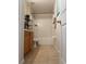 Clean bathroom featuring tub/shower combo and bright white tile at 1956 Myakka Ct, Poinciana, FL 34759