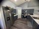 Well-equipped kitchen with stainless steel appliances, abundant storage, and modern countertops for meal preparation at 1956 Myakka Ct, Poinciana, FL 34759
