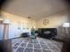 Stylish living room features a plush rug, modern furniture, and complementary decor for a cozy atmosphere at 1956 Myakka Ct, Poinciana, FL 34759