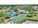 Aerial view of community amenities including pool, tennis, and basketball courts at 2629 Maggiore Cir, Kissimmee, FL 34746