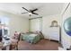 Cozy bedroom with carpet flooring, large window and natural light at 2629 Maggiore Cir, Kissimmee, FL 34746