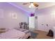 This bedroom has carpeted floors and features a ceiling fan and closet at 2629 Maggiore Cir, Kissimmee, FL 34746