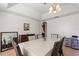 Spacious dining room with a tray ceiling, chandelier, and large table for entertaining at 2629 Maggiore Cir, Kissimmee, FL 34746