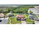 Lovely two-story home boasts a manicured lawn and mature landscaping at 2629 Maggiore Cir, Kissimmee, FL 34746