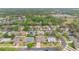 Aerial shot of a suburban neighborhood featuring well-maintained homes and greenery at 2877 Ashton Ter, Oviedo, FL 32765