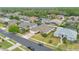Suburban neighborhood showcasing well-maintained homes, mature trees, and neatly landscaped yards at 2877 Ashton Ter, Oviedo, FL 32765