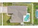 Stunning aerial view of a home with a backyard pool and well-manicured landscaping at 2877 Ashton Ter, Oviedo, FL 32765