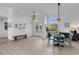 Bright foyer features high ceilings, hardwood floors, and large windows offering natural light at 2877 Ashton Ter, Oviedo, FL 32765
