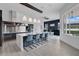 Modern kitchen boasting a large island, stainless steel appliances, and sleek cabinetry at 2877 Ashton Ter, Oviedo, FL 32765