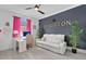 Bright and inviting office space with a sleek white desk, comfortable seating, and stylish decor at 2877 Ashton Ter, Oviedo, FL 32765