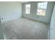 Bright room featuring multiple windows at 30108 Misty Pines Rd, Mount Dora, FL 32757