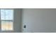Bright room featuring a large window at 30108 Misty Pines Rd, Mount Dora, FL 32757