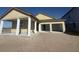 Home under construction, showing unfinished exterior and large front columns at 30162 Rustic Mill St, Mount Dora, FL 32757