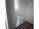 A laundry room with hookups and space for appliances with a doorway leading to other parts of the home at 30162 Rustic Mill St, Mount Dora, FL 32757