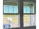 A window view showing the view of the property's street and location at 30162 Rustic Mill St, Mount Dora, FL 32757