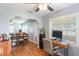 Inviting living space featuring hardwood floors and a comfortable workspace near a window at 311 E Wallace St, Orlando, FL 32809