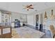 Spacious room featuring dark floors, a ceiling fan, and a large closet at 3420 Arnel Dr, Winter Park, FL 32792