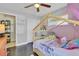 Stylish ' bedroom boasts hardwood floors, a canopy bed, ample storage, and a serene atmosphere at 3420 Arnel Dr, Winter Park, FL 32792