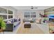 Bright living room with modern furnishings, neutral paint and large windows at 3420 Arnel Dr, Winter Park, FL 32792