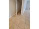 Hallway with tile flooring and a closet at 3433 Soho St # 101, Orlando, FL 32835
